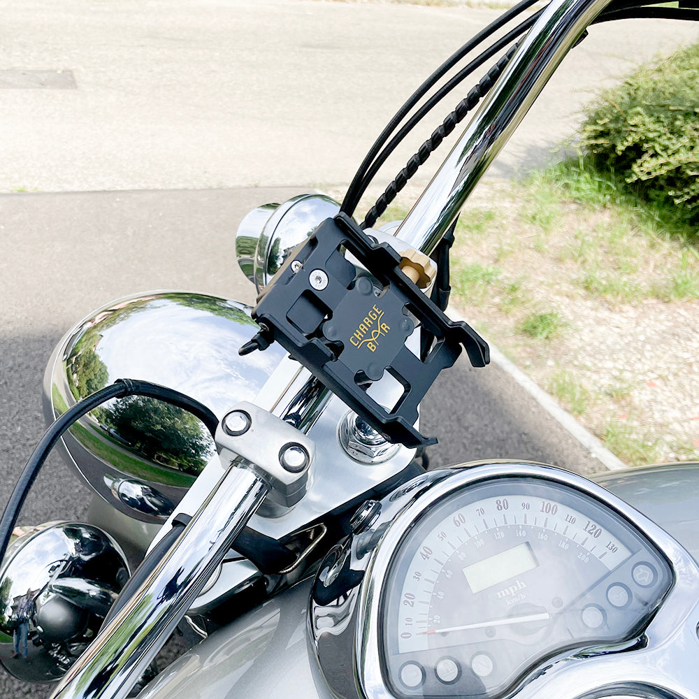 Rezgéscsillapított motoros telefontöltő és tartó